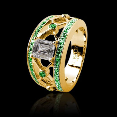 Emerald cut emerald paving ring